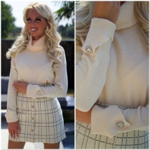 Pull koll crème hartjes knoop 