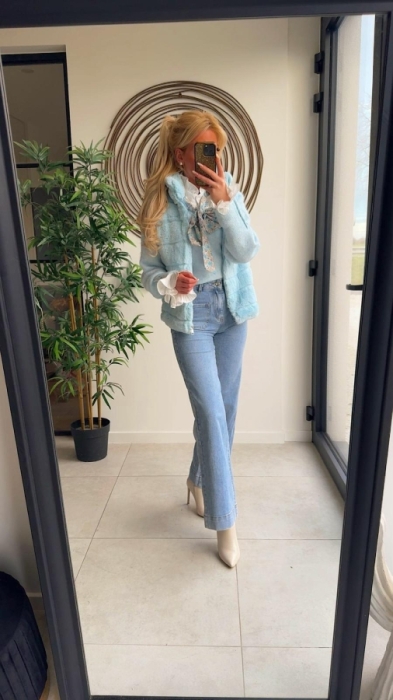 Pull lichtblauw strik bloemen 