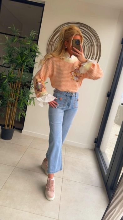 Pull jaune saumon paillettes fleur