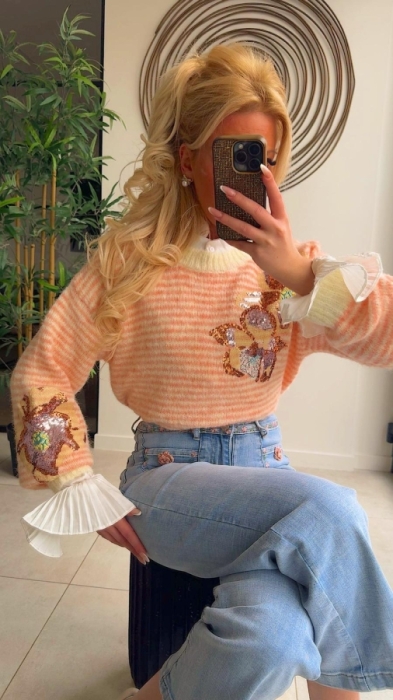 Pull jaune saumon paillettes fleur