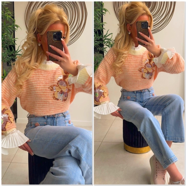 Pull jaune saumon paillettes fleur