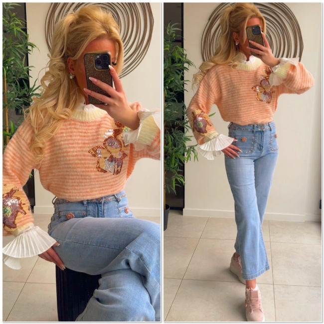 Pull jaune saumon paillettes fleur