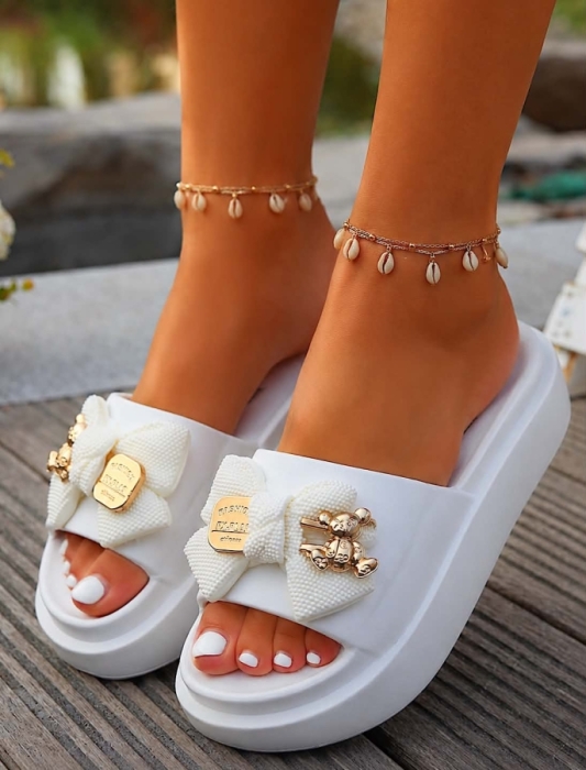 Slipper wit strik 